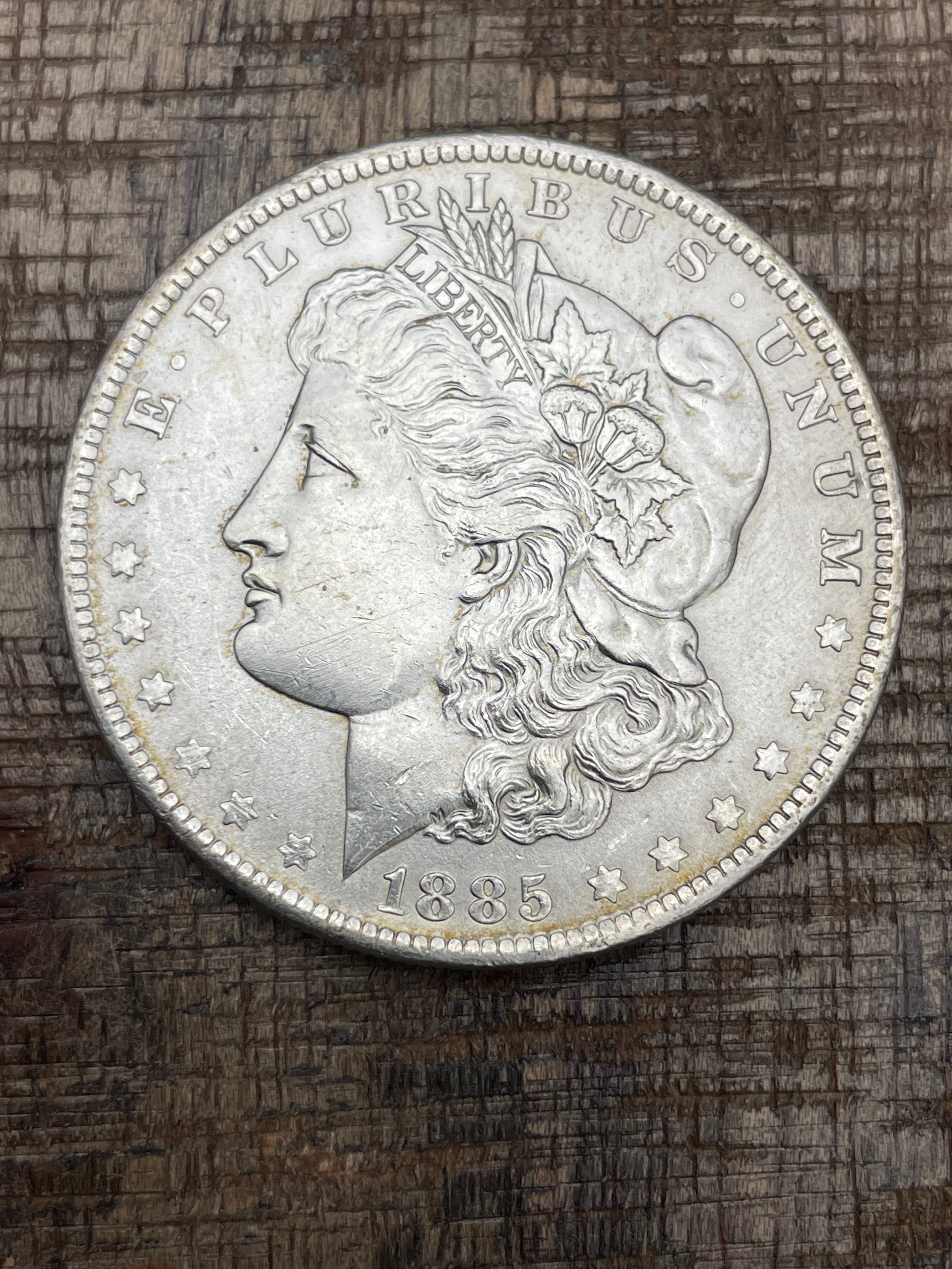 1885-O $1 US Morgan Silver Dollar