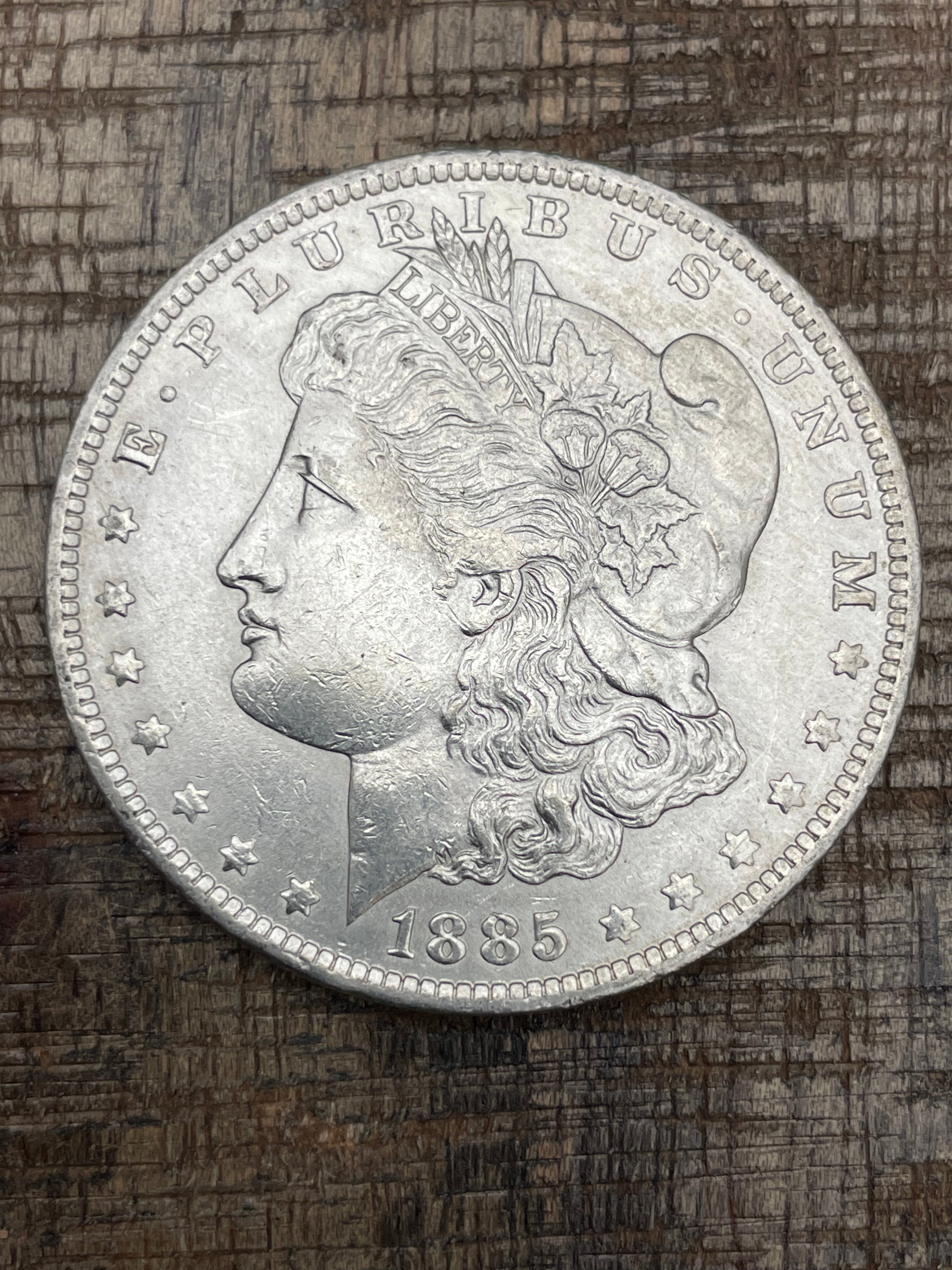 1885-O $1 US Morgan Silver Dollar