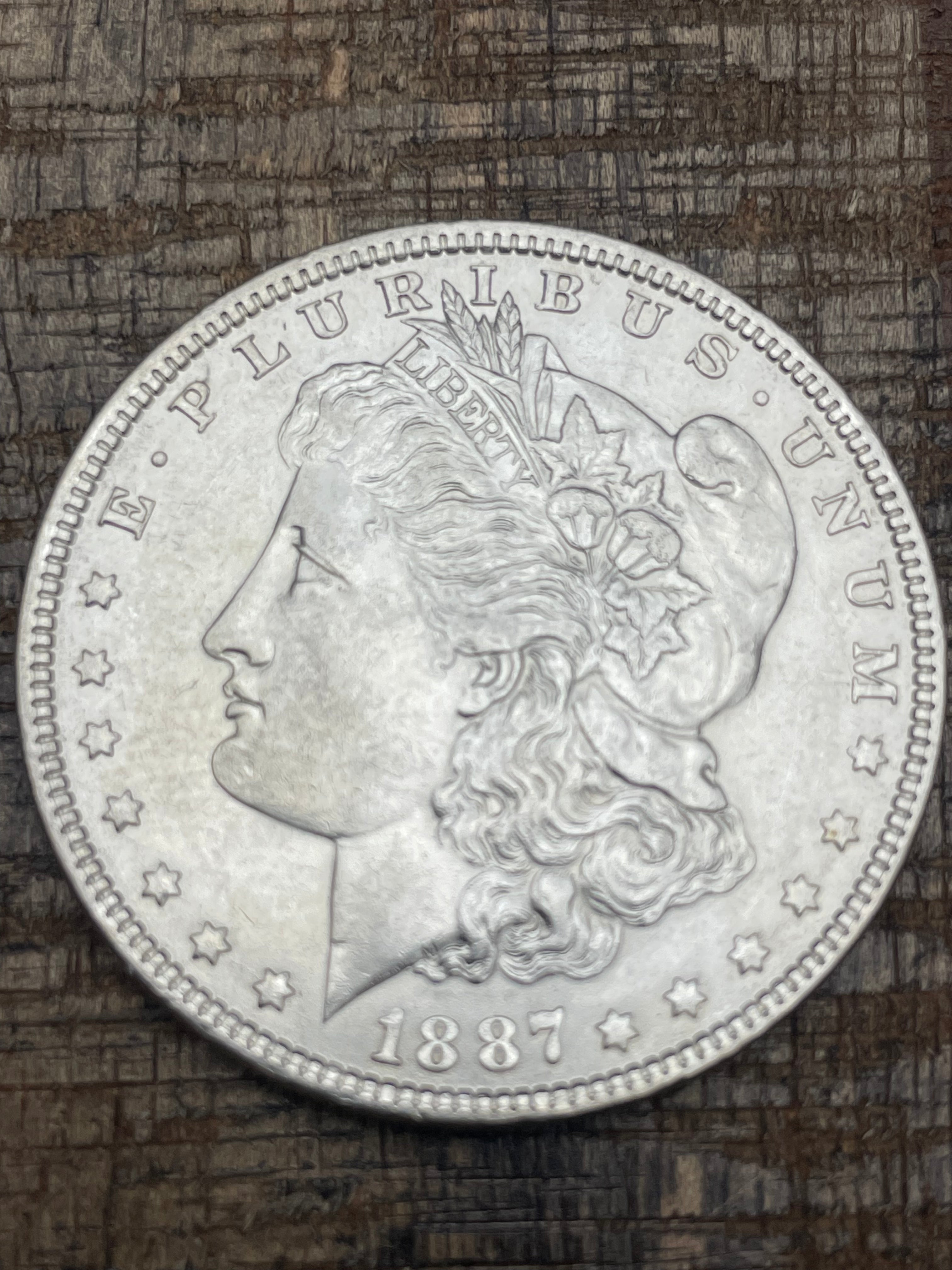 1887 $1 US Morgan Silver Dollar