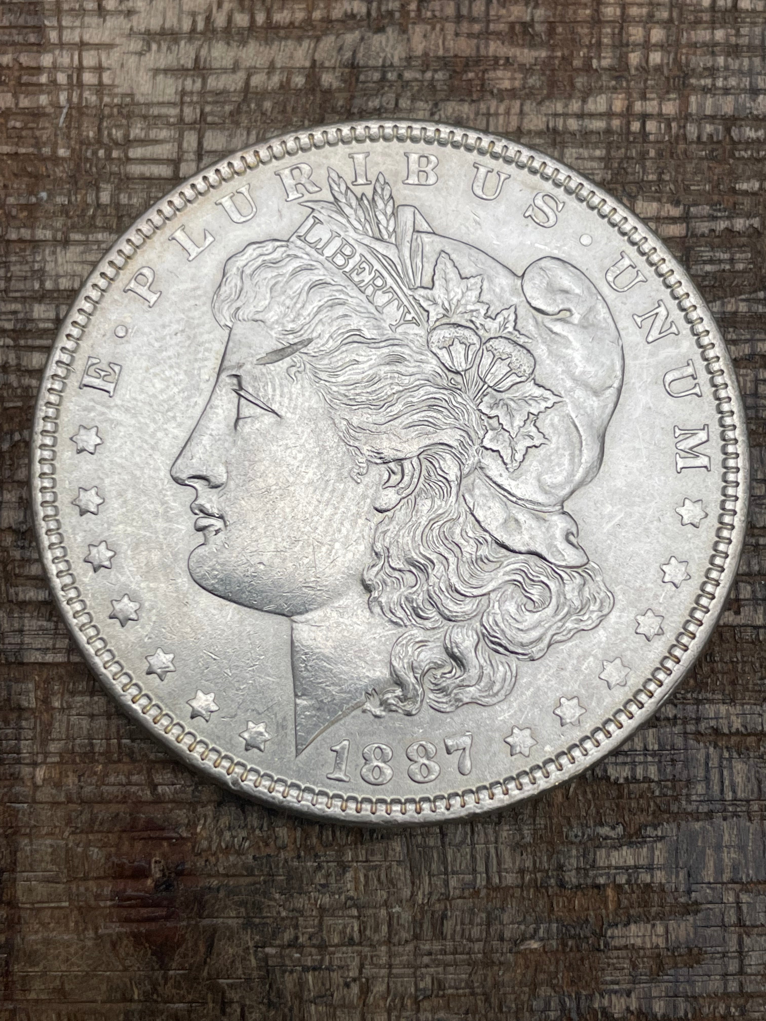 1887 $1 US Morgan Silver Dollar