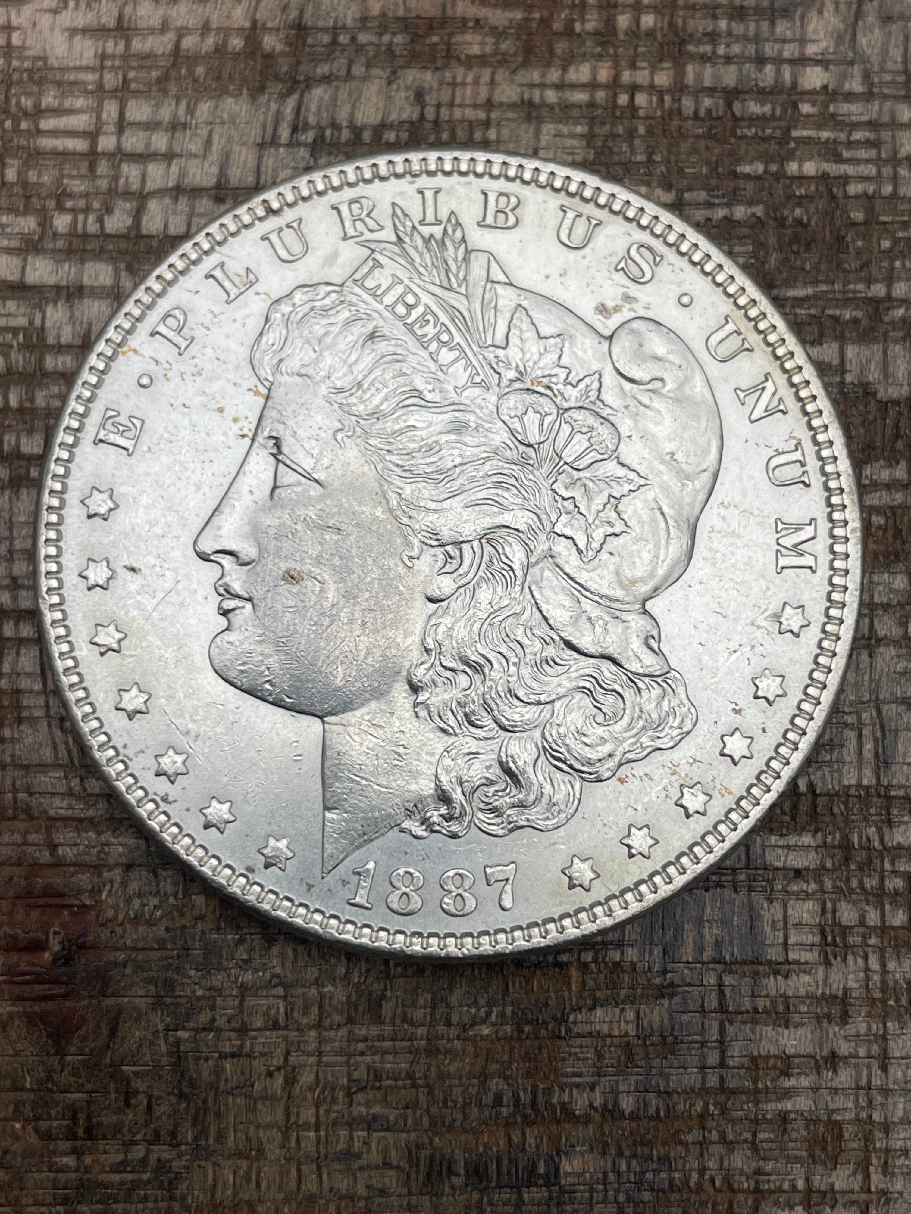 1887 $1 US Morgan Silver Dollar