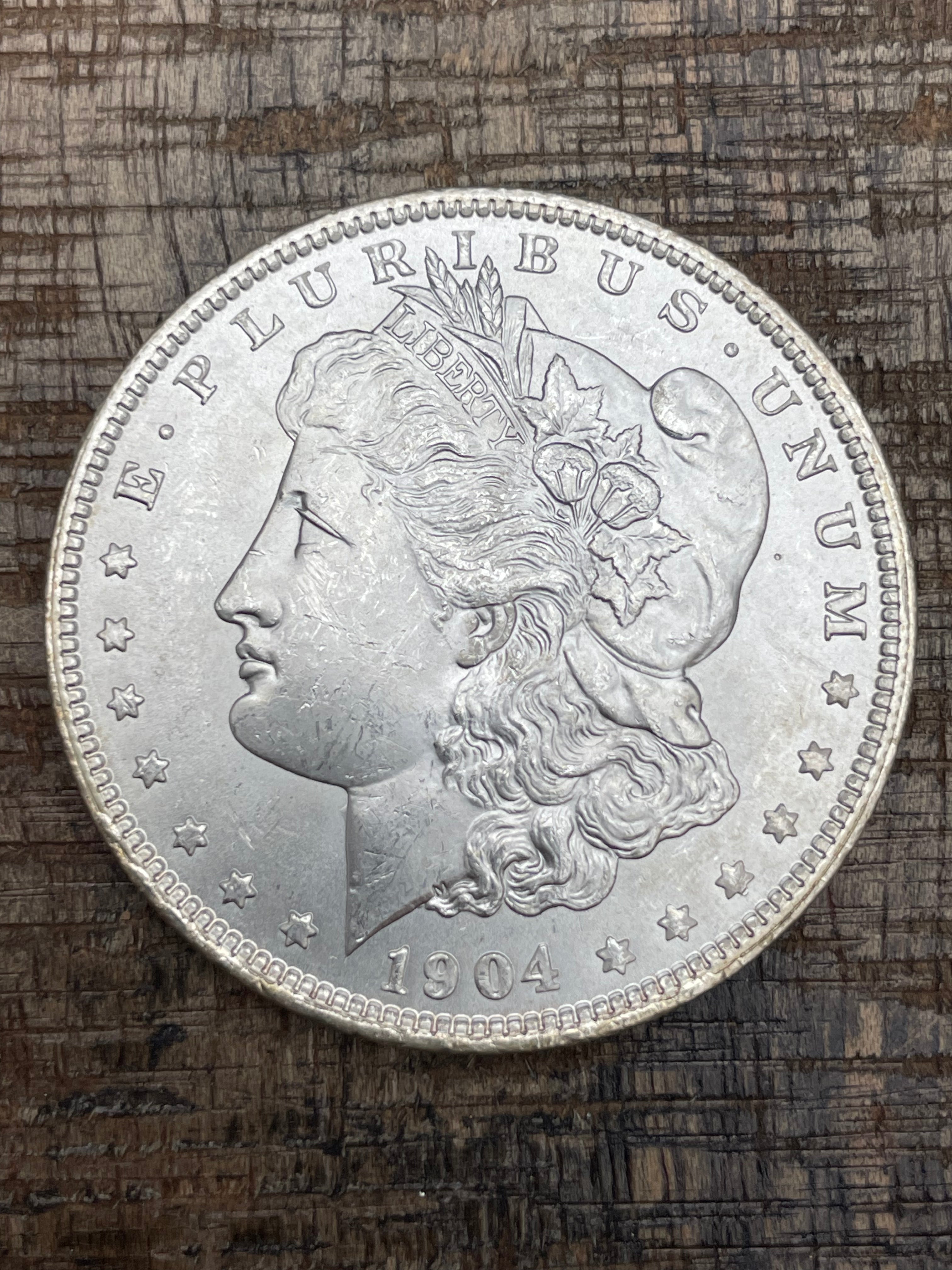 1904-O $1 US Morgan Silver Dollar