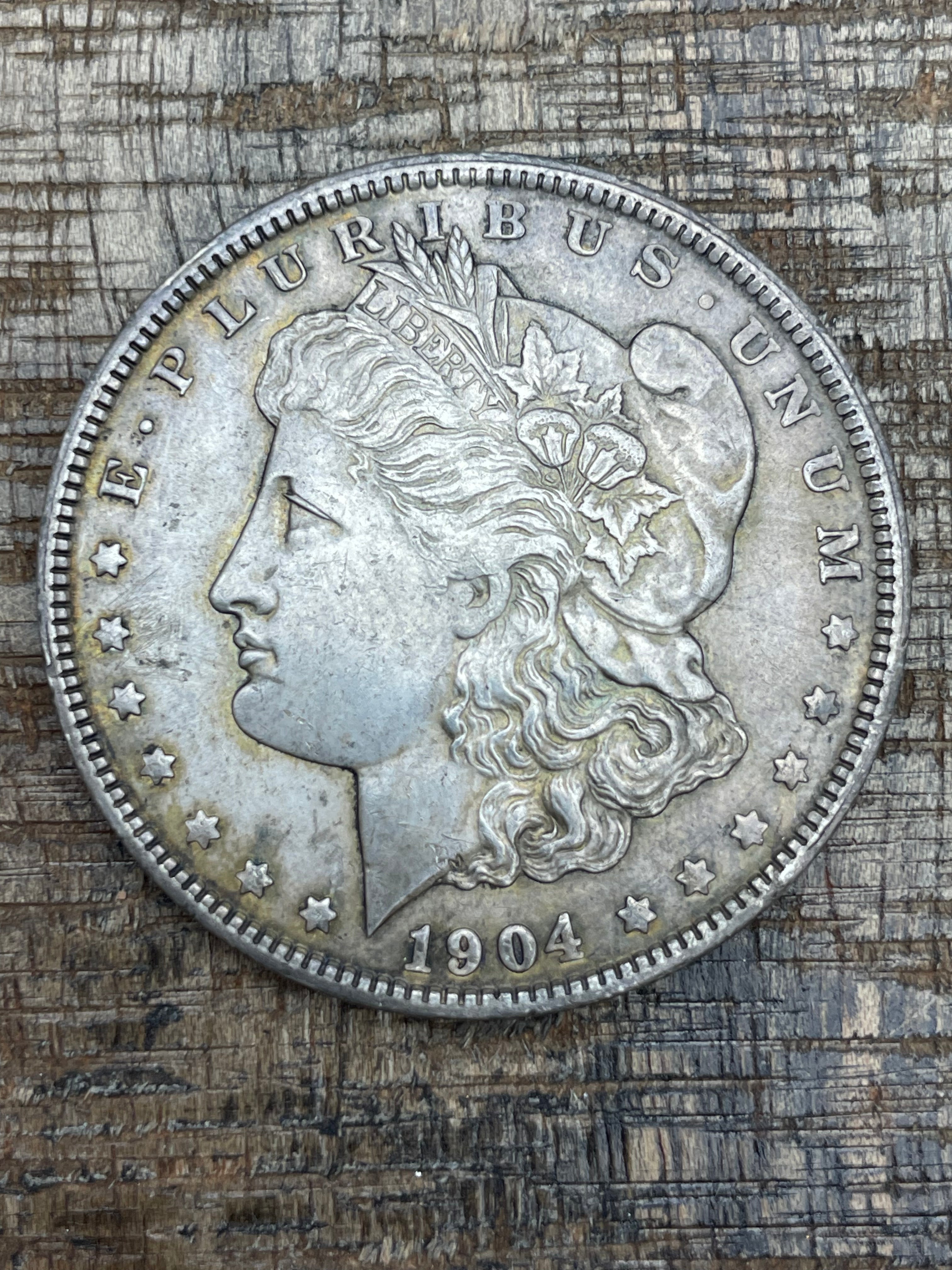 1904-O $1 US Morgan Silver Dollar