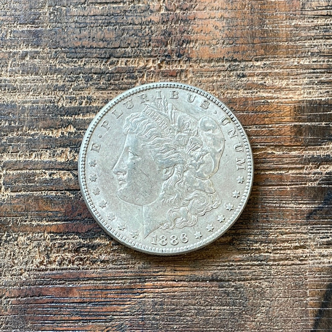 1886 $1 US Morgan Silver Dollar