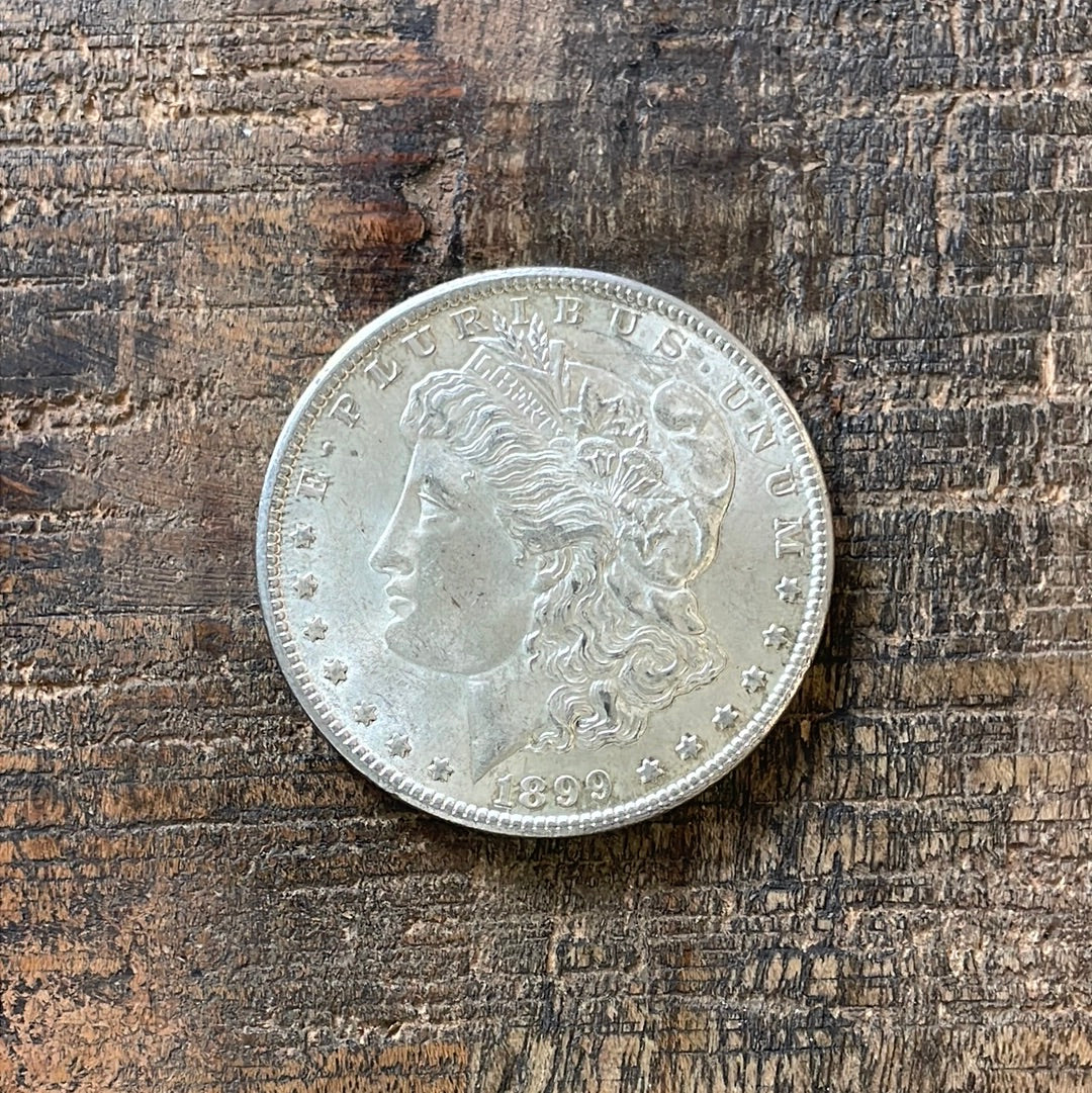 1899-O $1 US Morgan Silver Dollar