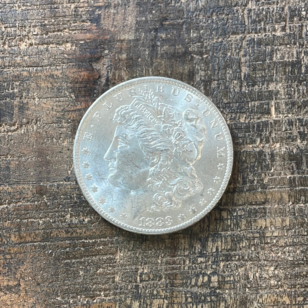 1883-O $1 US Morgan Silver Dollar