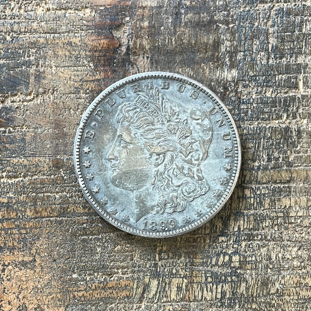 1899-O $1 US Morgan Silver Dollar