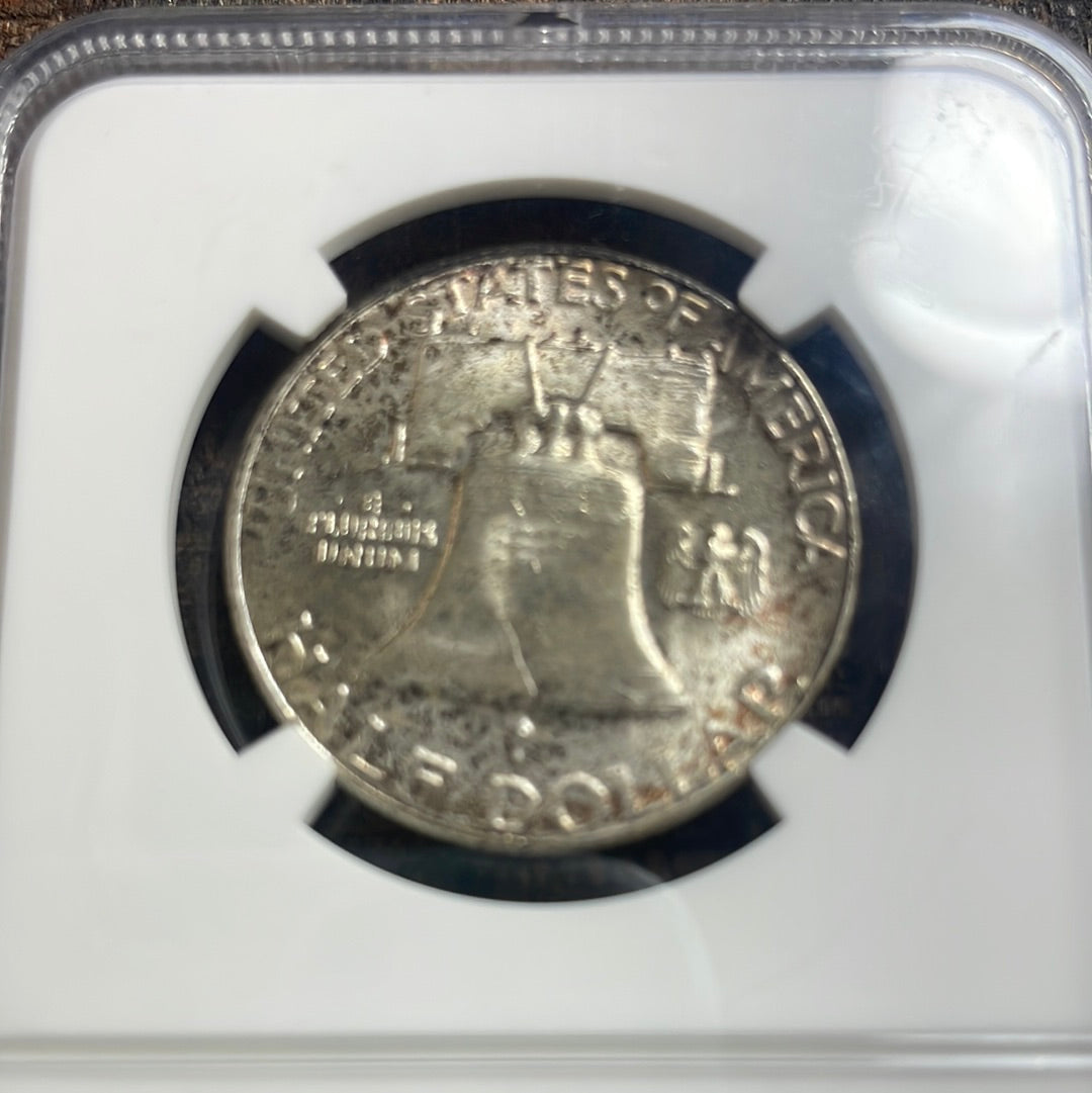 1954 50c Franklin Half Dollar NGC MS66 Rainbow Toned